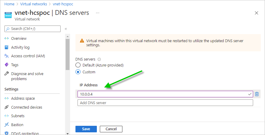 Screenshot of our POC-AD VM's private IP address added to the DNS servers pane and a green arrow pointing to the entered IP address..
